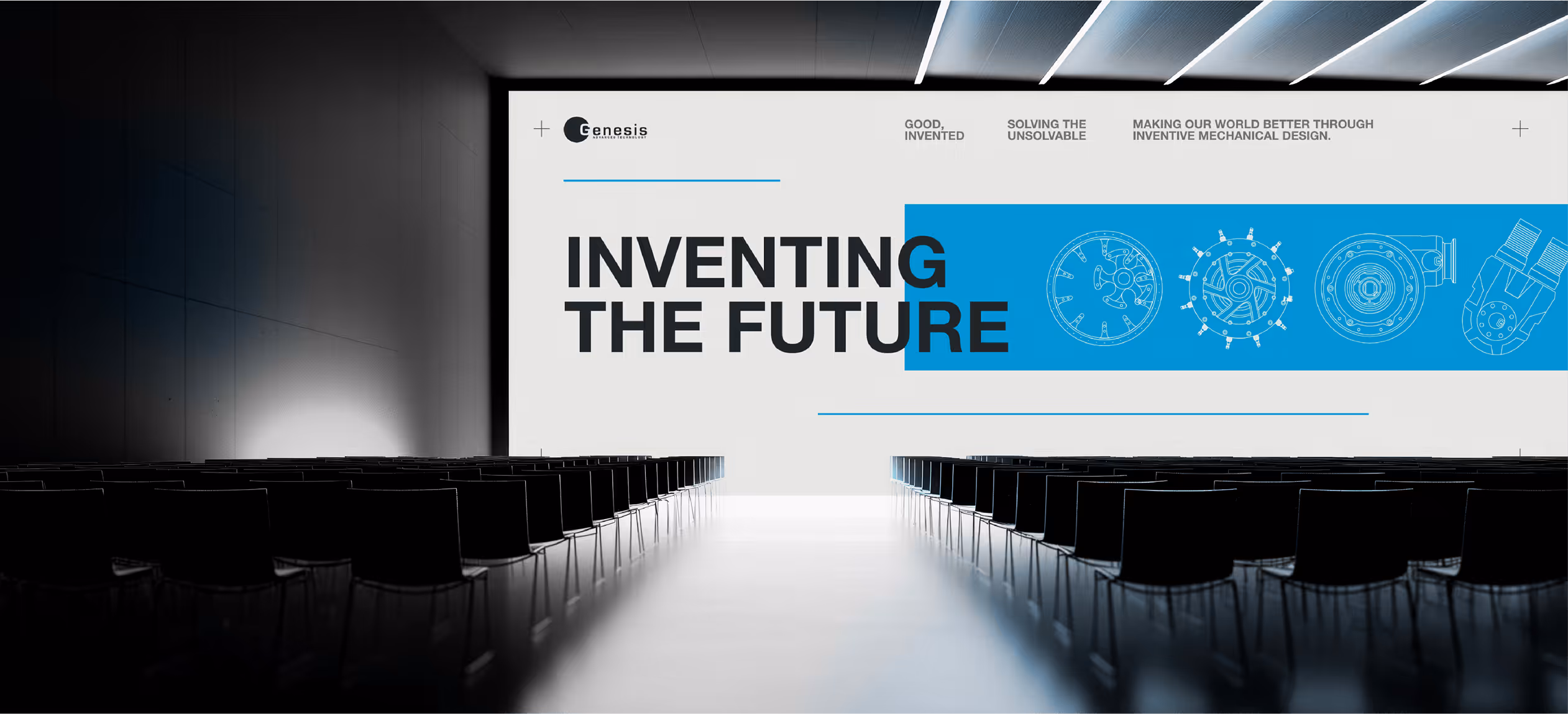An empty auditorium with a large LED screen showcasing the genesis advanced technology brand.