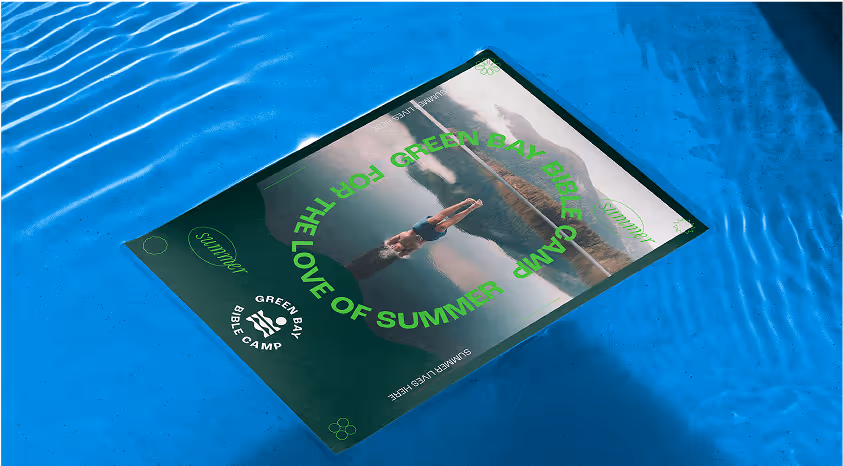 A poster for green bay bible camp floating in a pool.