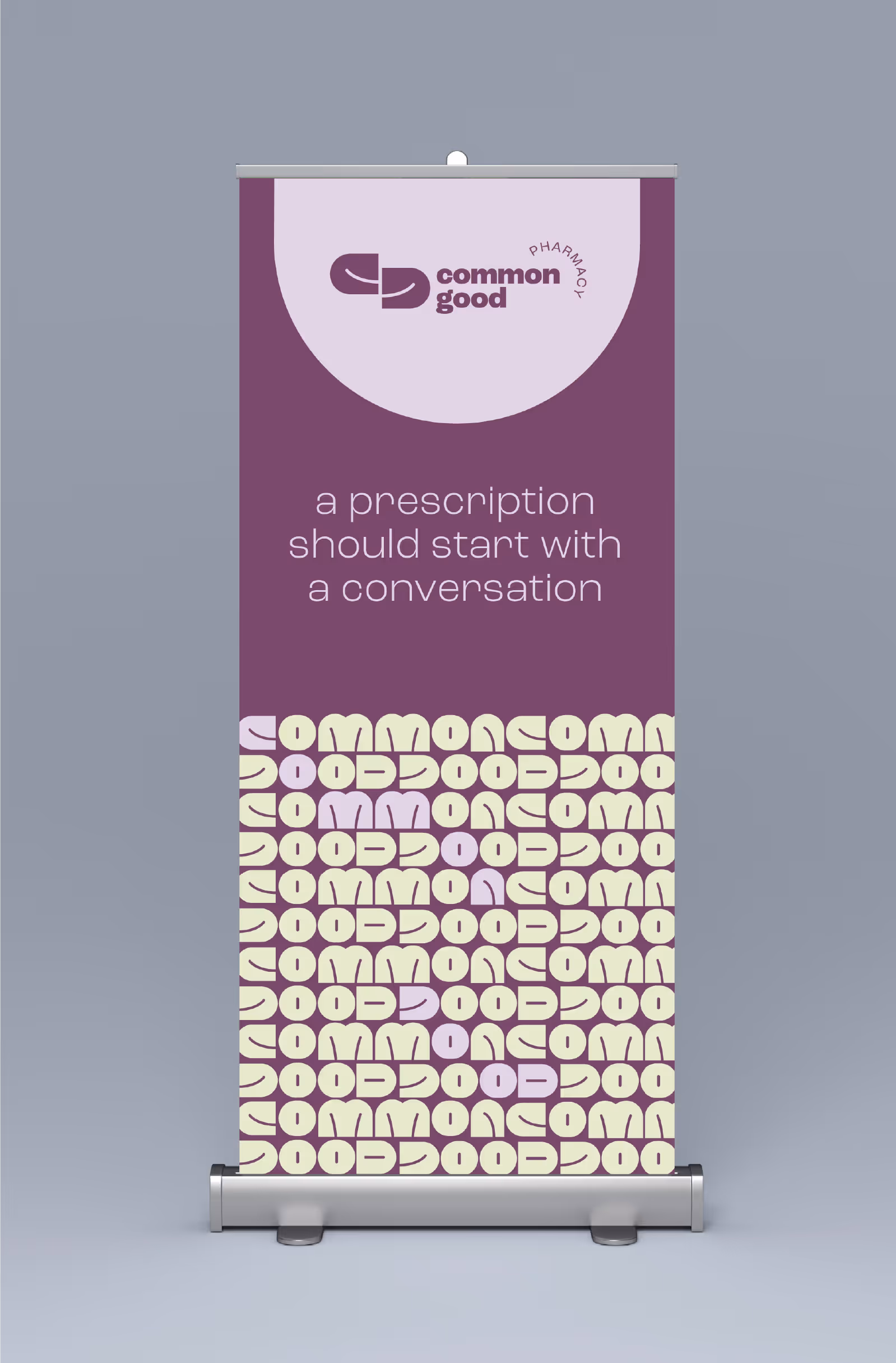 A pull up banner showcasing the common good branding.