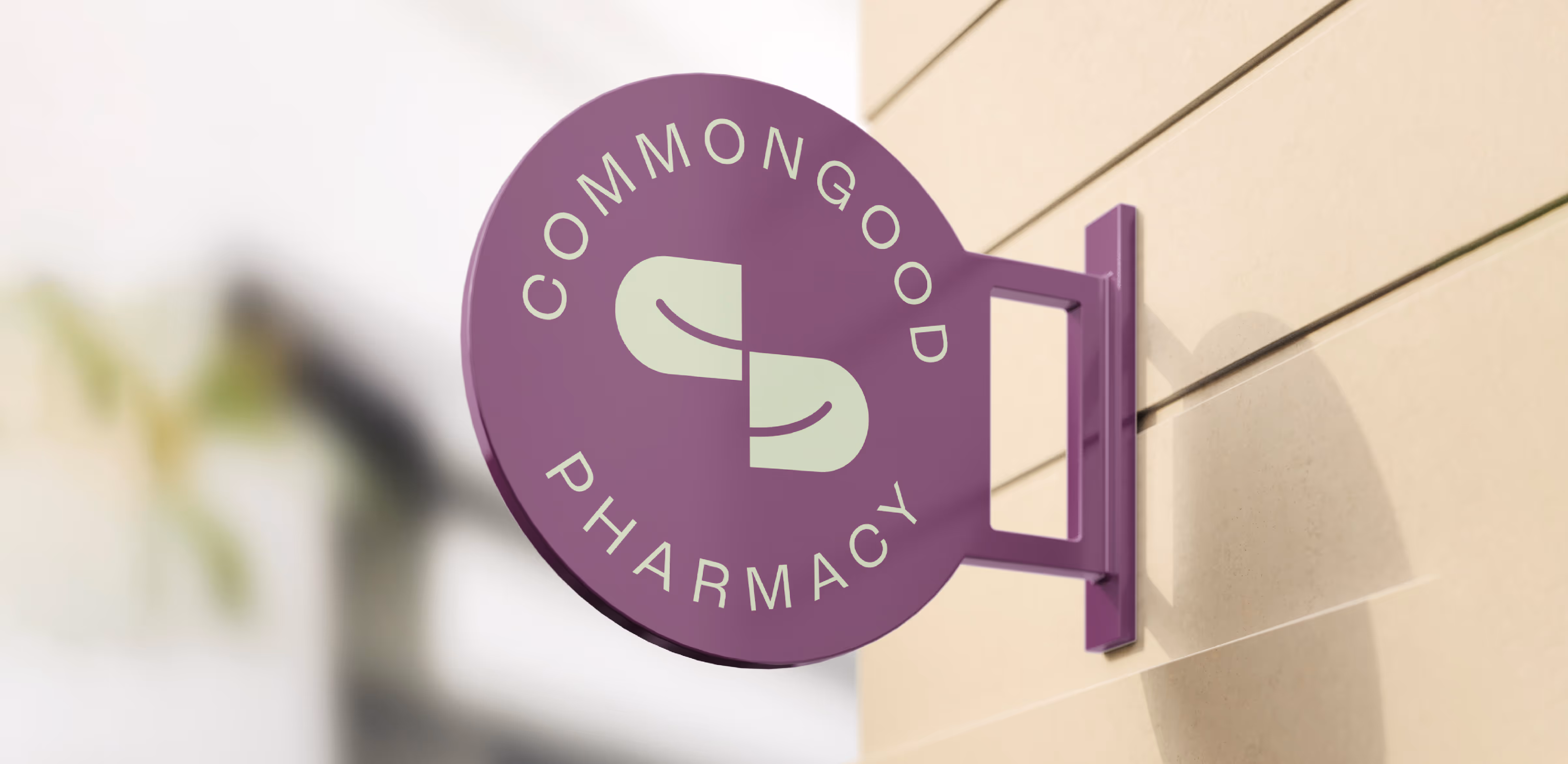 Exterior signage for common good pharmacy.