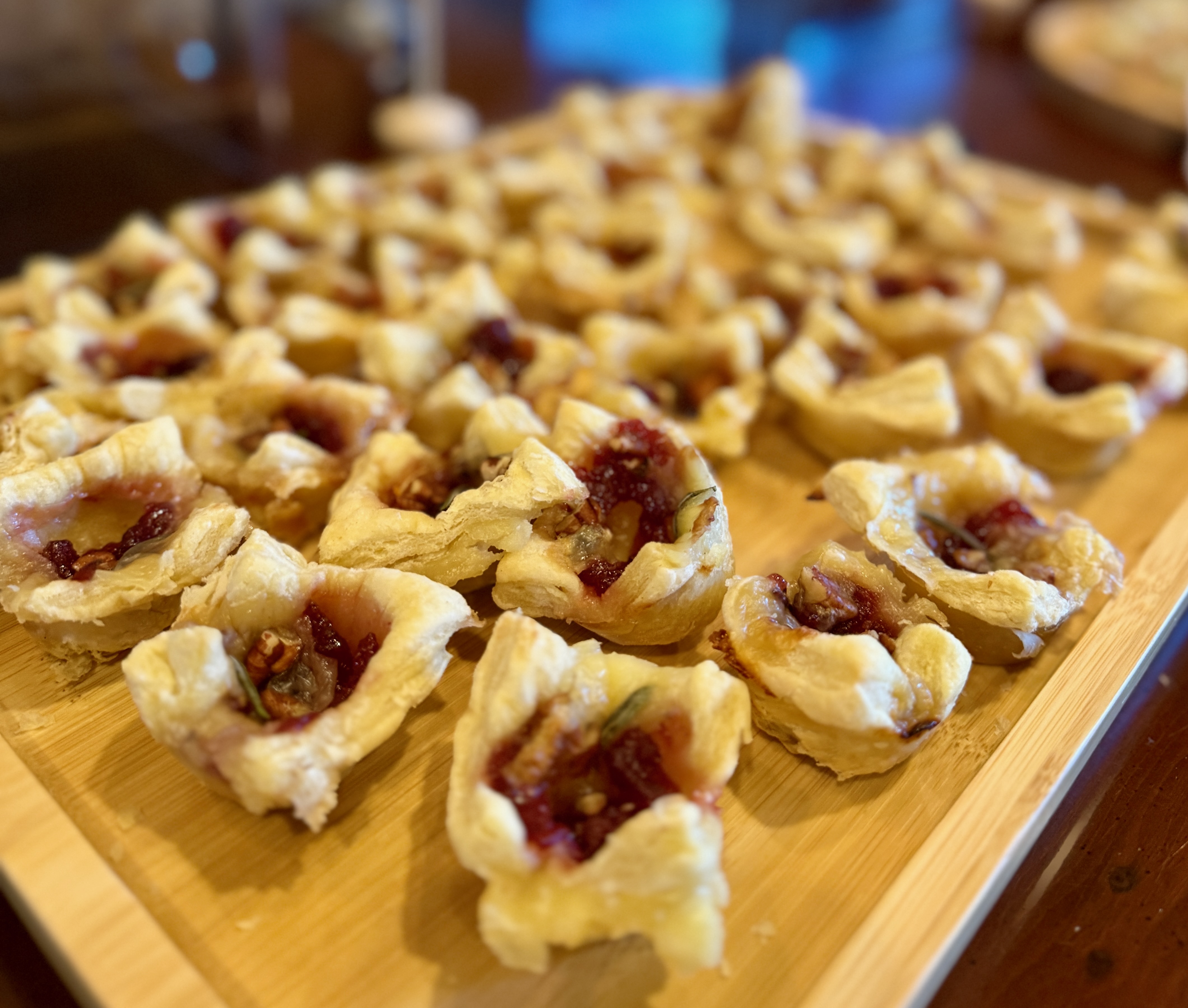 Tasty wandering pastry bites with jam and flaky golden crust