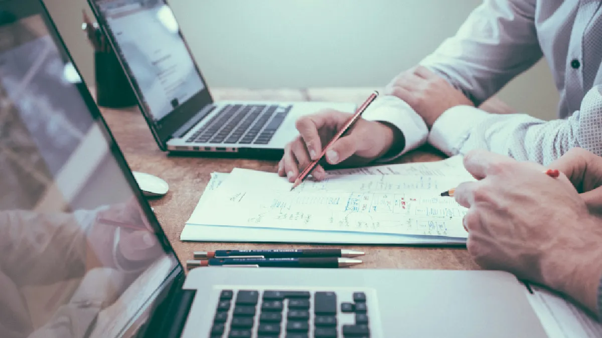 Employers reviewing an implementation plan for the Keep Britain Working recommendations