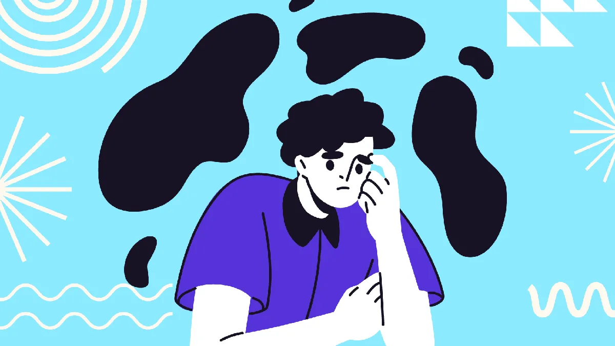 Worried person holding their head, representing ways to manage and reduce festive financial stress