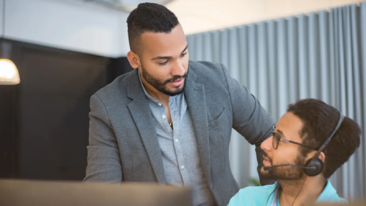 Senior leader speaking with an employee to promote psychological safety at work