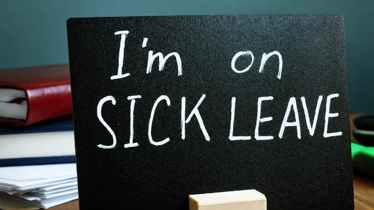 Sign reading “I’m on sick leave”, representing the UK workplace absence crisis and HR prevention strategy