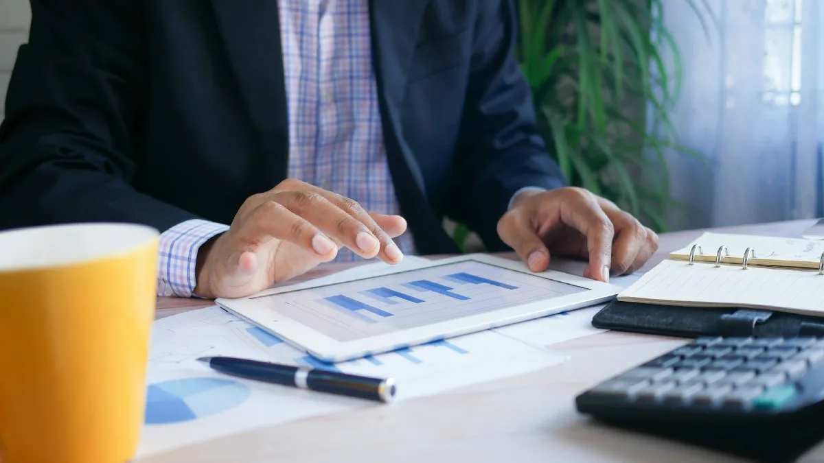 Professional reviewing financial data to identify the one money move that actually matters