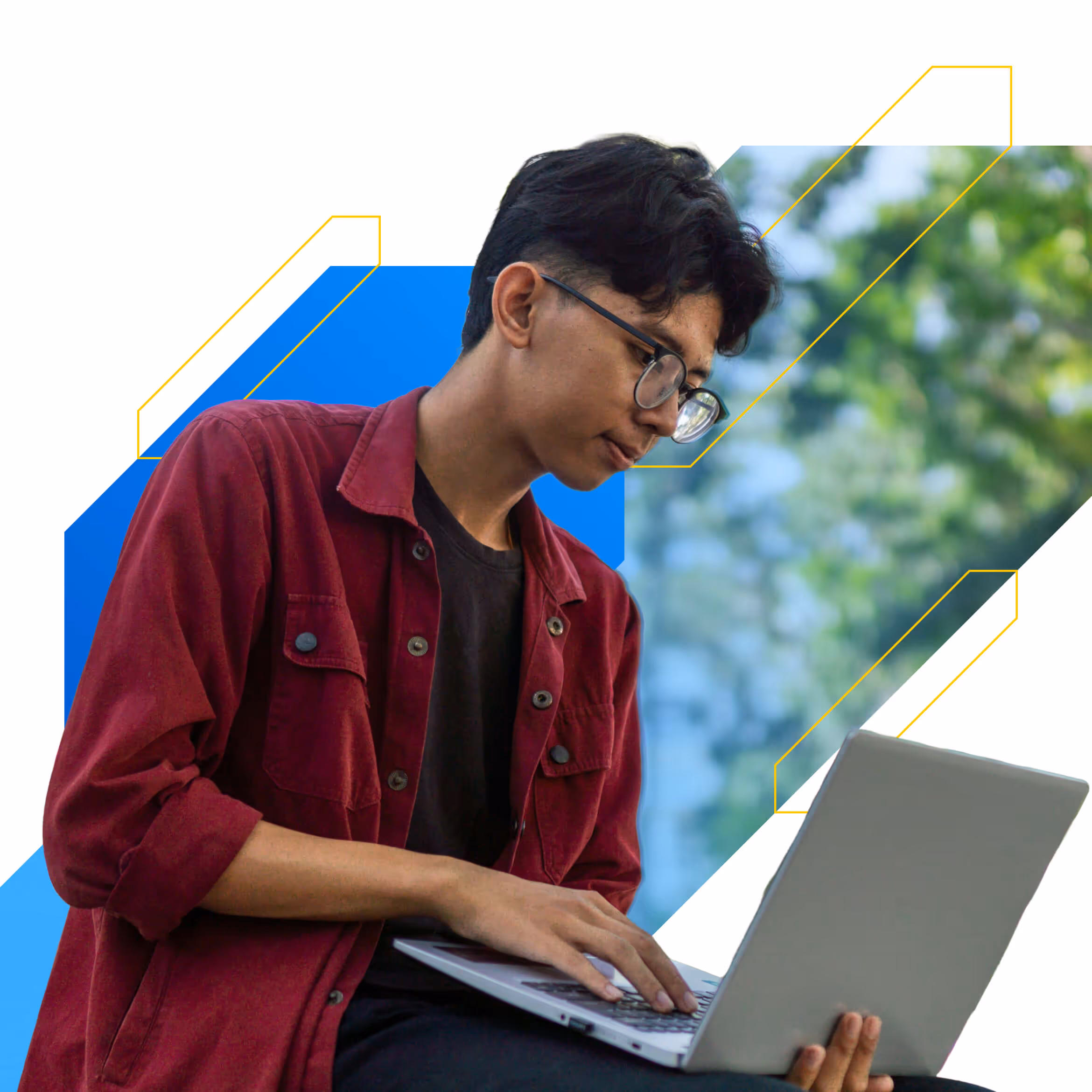 A student working on a laptop.