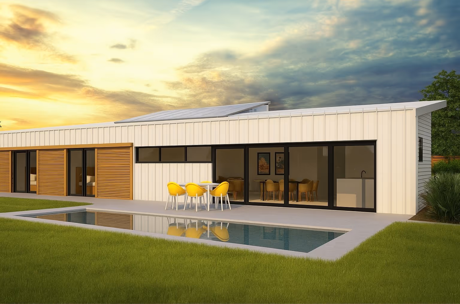 Modern duplex with large glass windows and balcony, featuring sleek black garage doors and lush greenery surrounding the exterior.