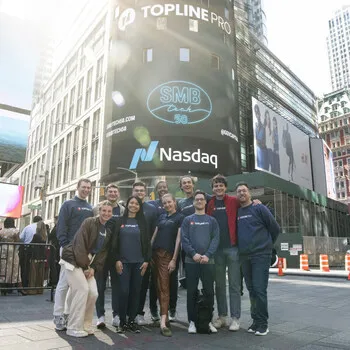 Topline Pro Team celebrating SMBTech 50 Award
