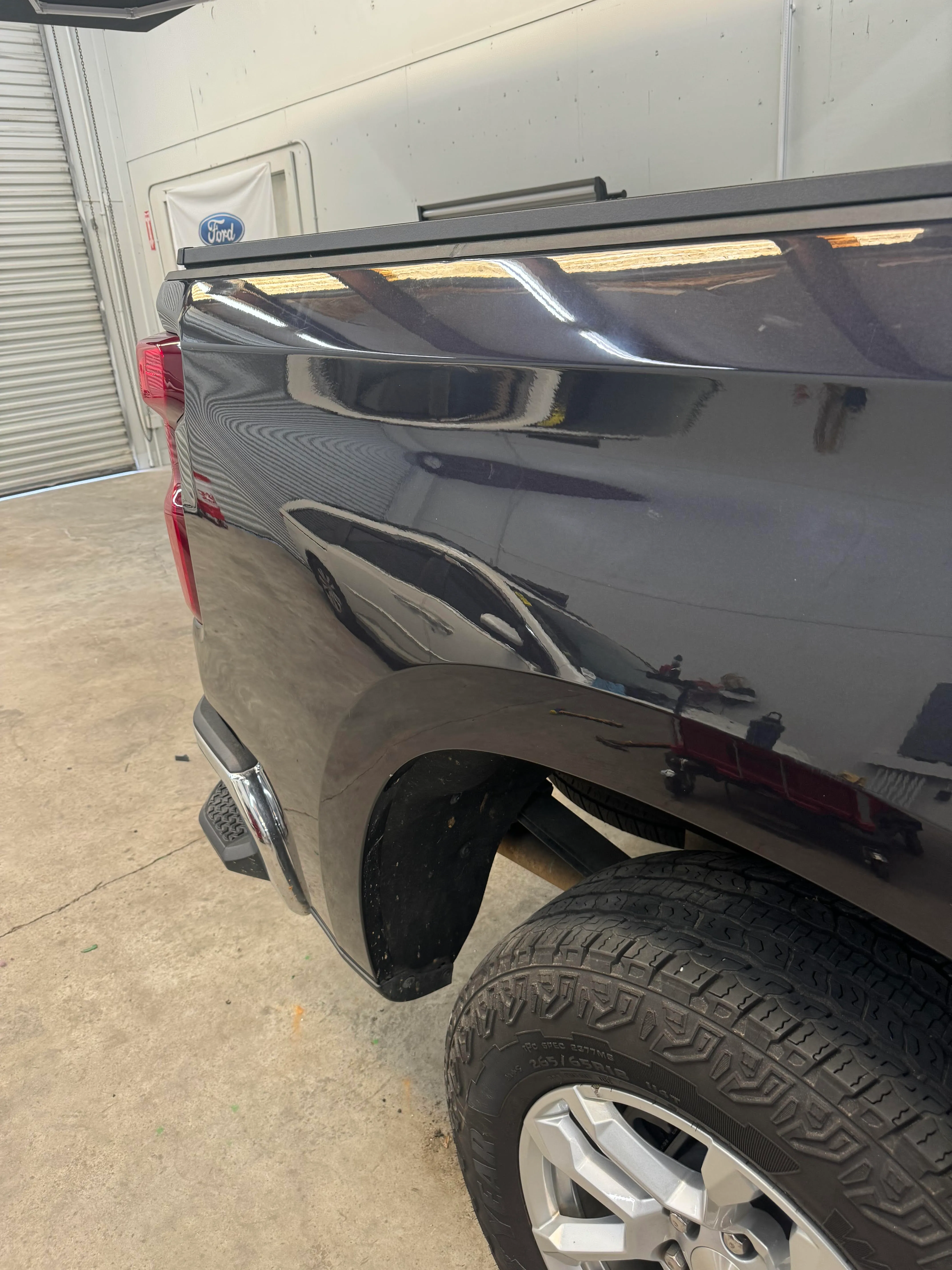 Door panel restored after large dent removed