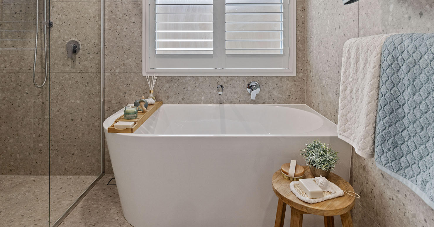 new bathroom with feature bathtub