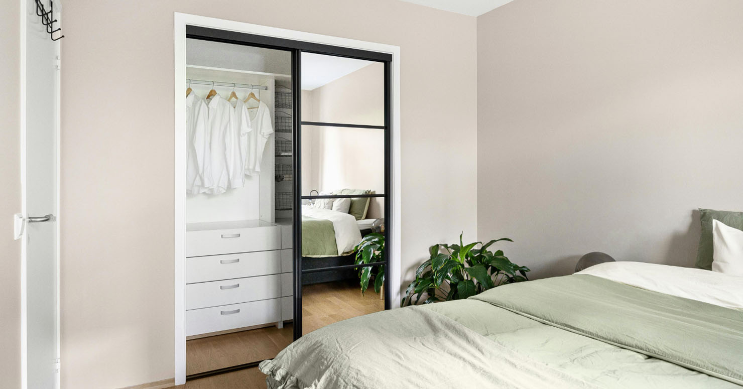 bedroom with sliding door wardrobe