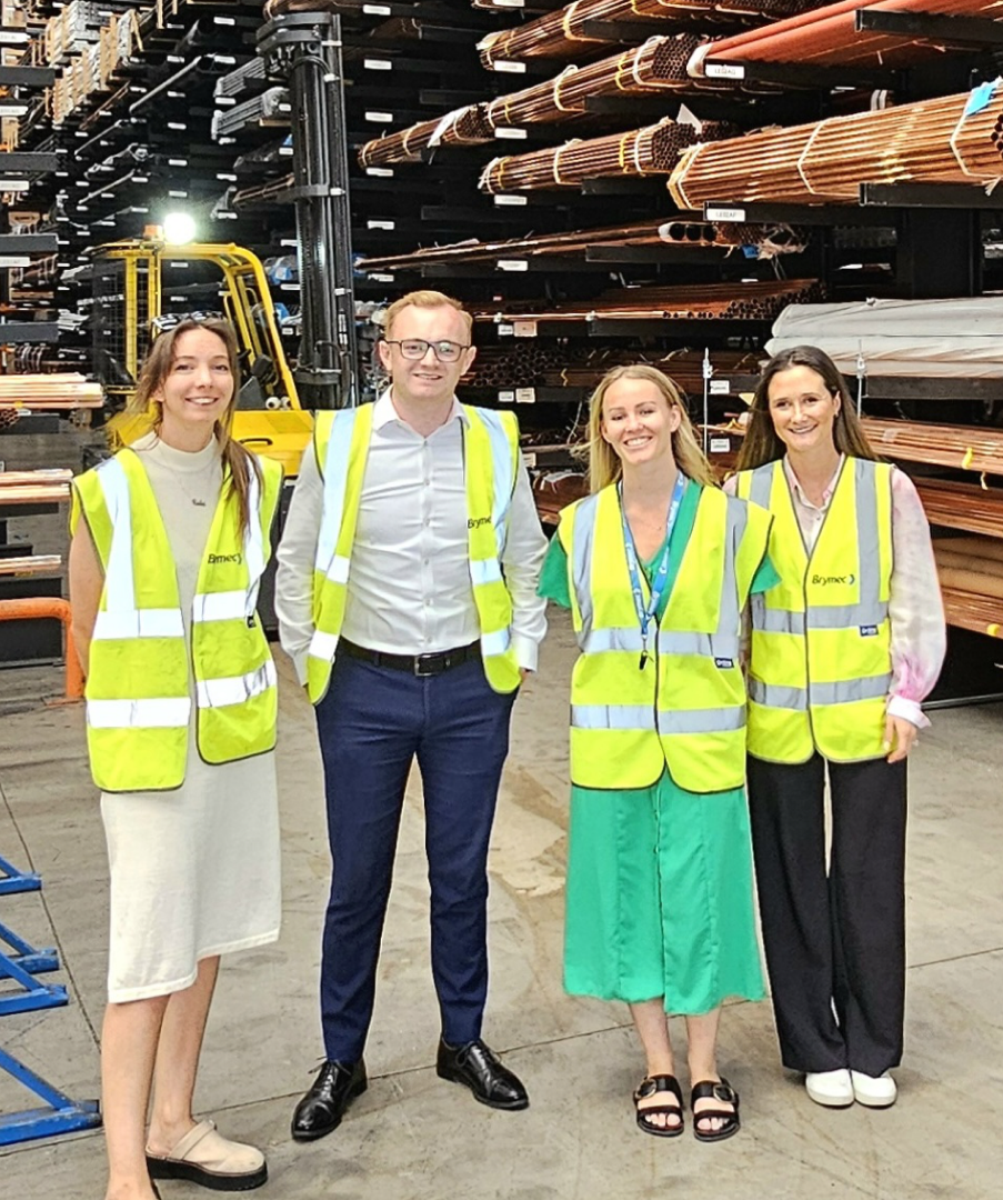 The Jointly team in hi-vis vests on a client site visit