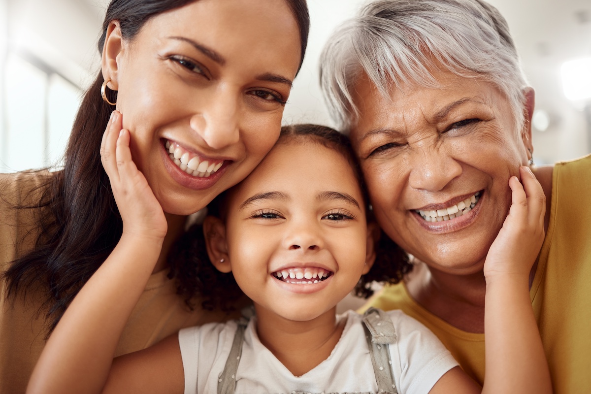 A smiling family at a dermatology clinic