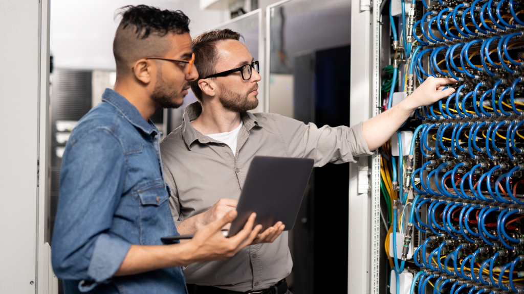 Two People Working In IT Support