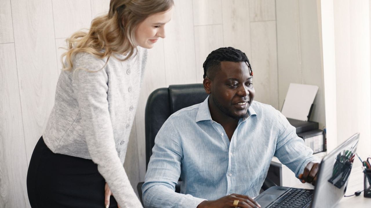 IT professionals combining business knowledge with technical expertise for effective support.