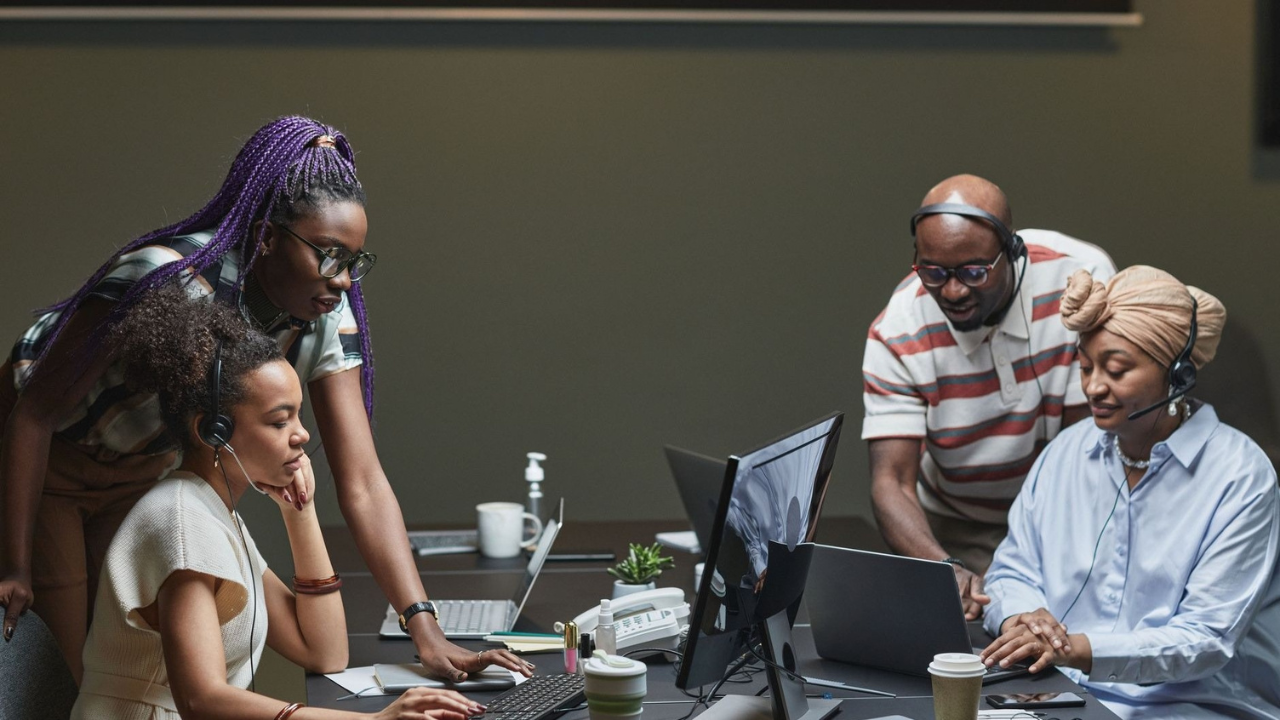 IT support team comparing in-house and outsourced service models for business needs.
