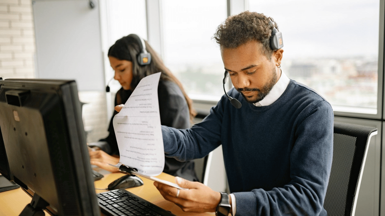 IT support professionals reviewing service requirements that affect monthly managed IT costs.