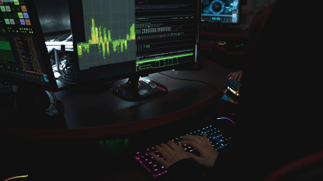 Security analyst monitoring alerts through an MSSP while internal teams manage response.