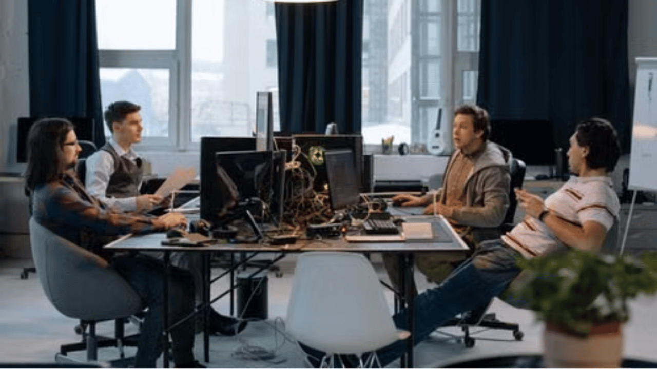 IT team coordinating internal and outsourced security responsibilities across monitoring and response.