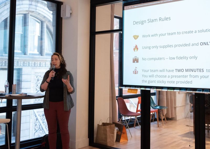 Jamie speaking at a Design Slam for PhillyChi, outlining the rules and instructions for the group of participants
