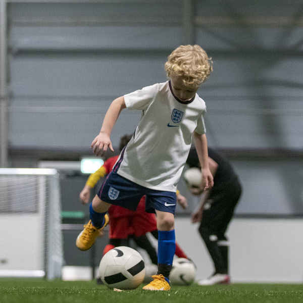 Small group football drill building tactical flexibility and ball control