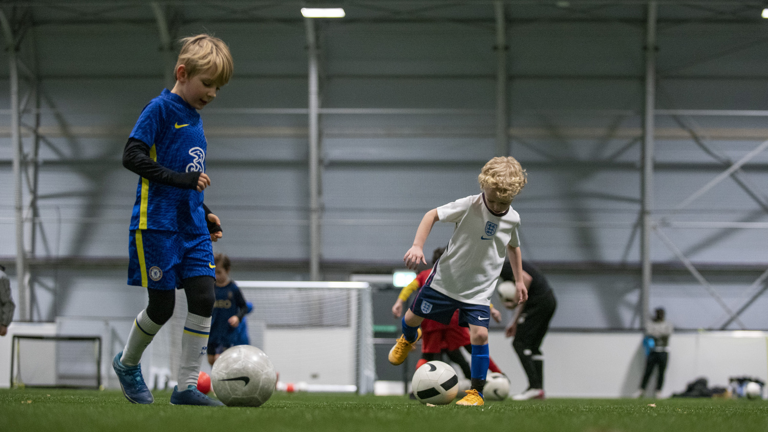Youth footballers exploring game awareness during training in Australia