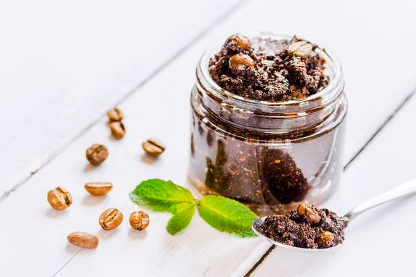 Coffee scrub is one of the best home remedies to tighten skin on stomach.