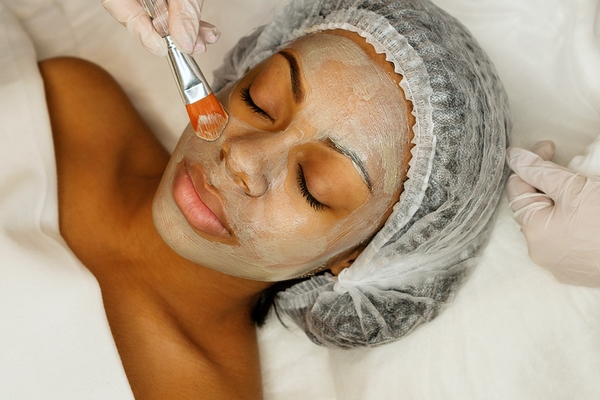 Skin exfoliation is a benefit of getting a facial.