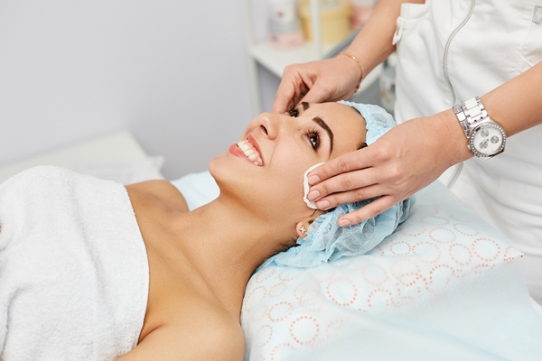 Acne treatment is a benefit of getting a facial.