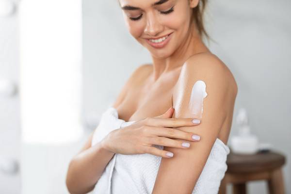 An exfoliating moisturizer is helpful for body and face.