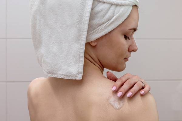 Apply an exfoliating scrub on body and face.