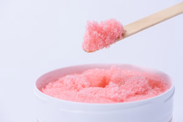 Sugar scrubs can be used to get soft hands naturally at home.