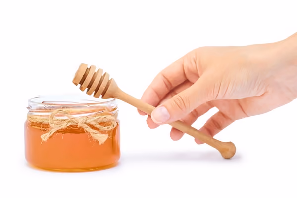 Raw honey can be used to get soft hands naturally at home.