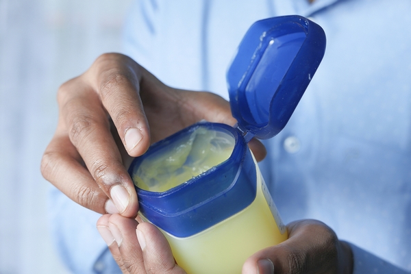 Petroleum jelly can be used to get soft hands naturally at home.