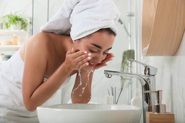 Can I wash my face after microneedling