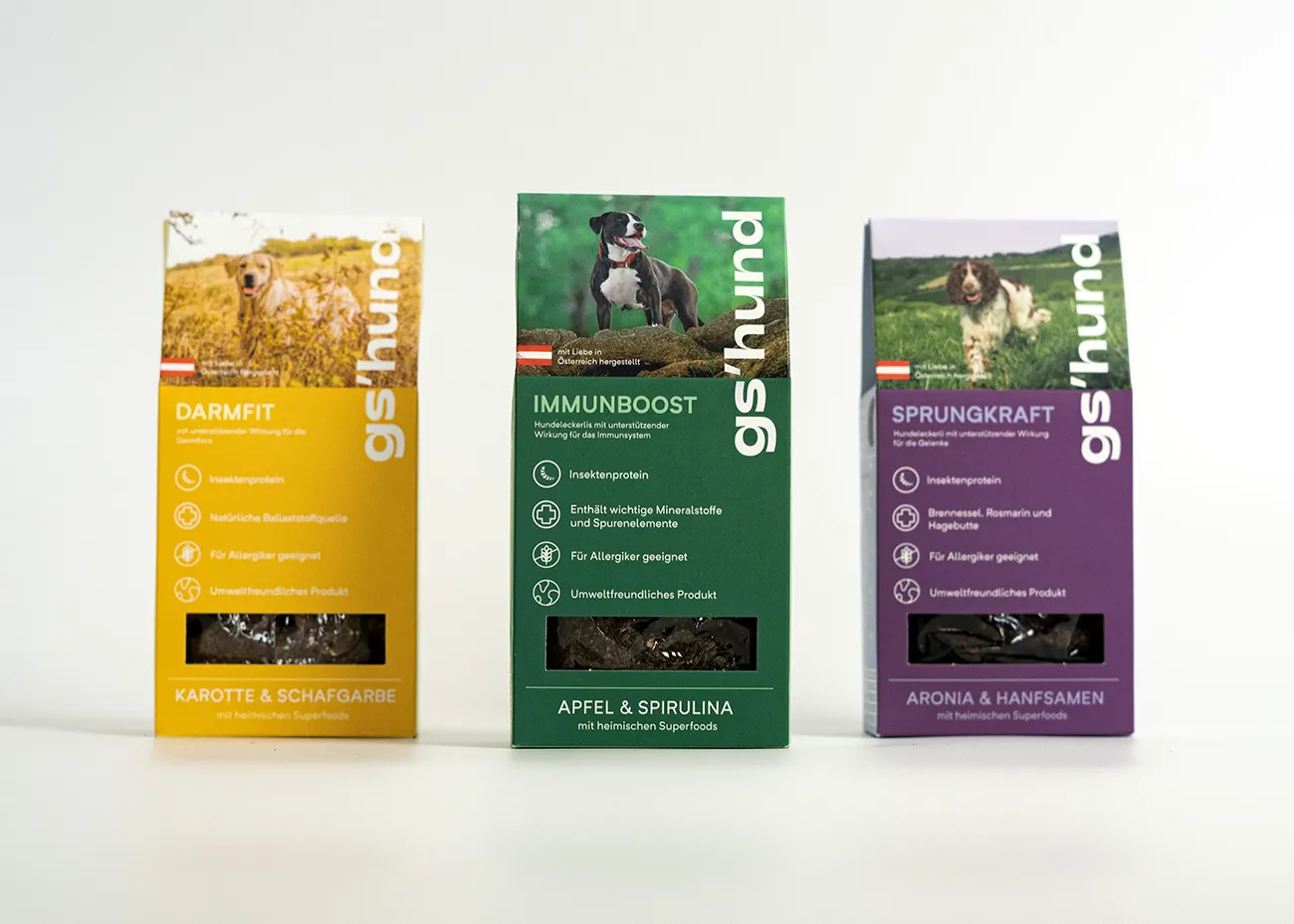 A photo of the three packages go gshund. Yellow, green and the purple edition