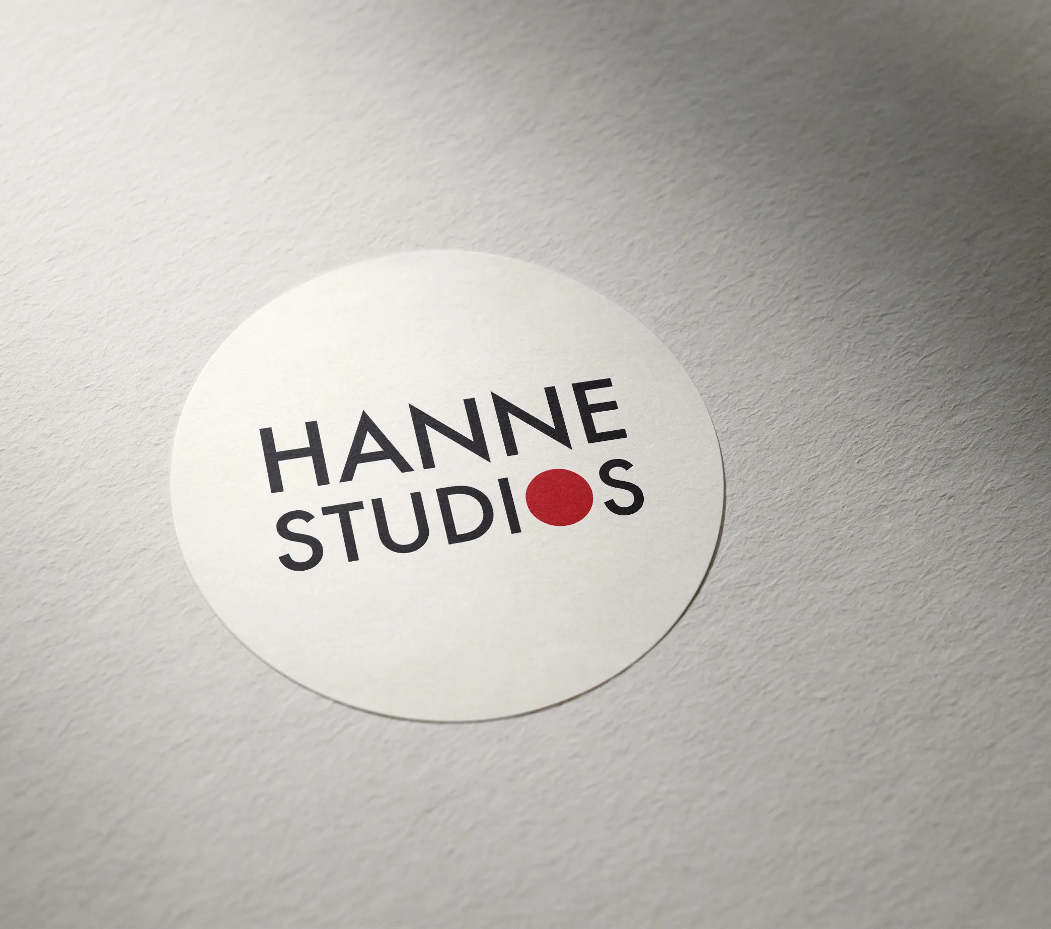 Minimal logo design and brand identity application for Hanne Studios.