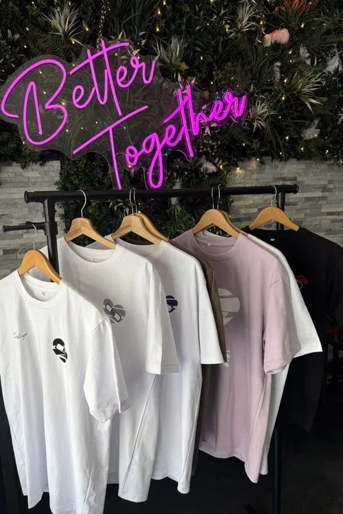 T_shirts_on_hangers_neon_sign