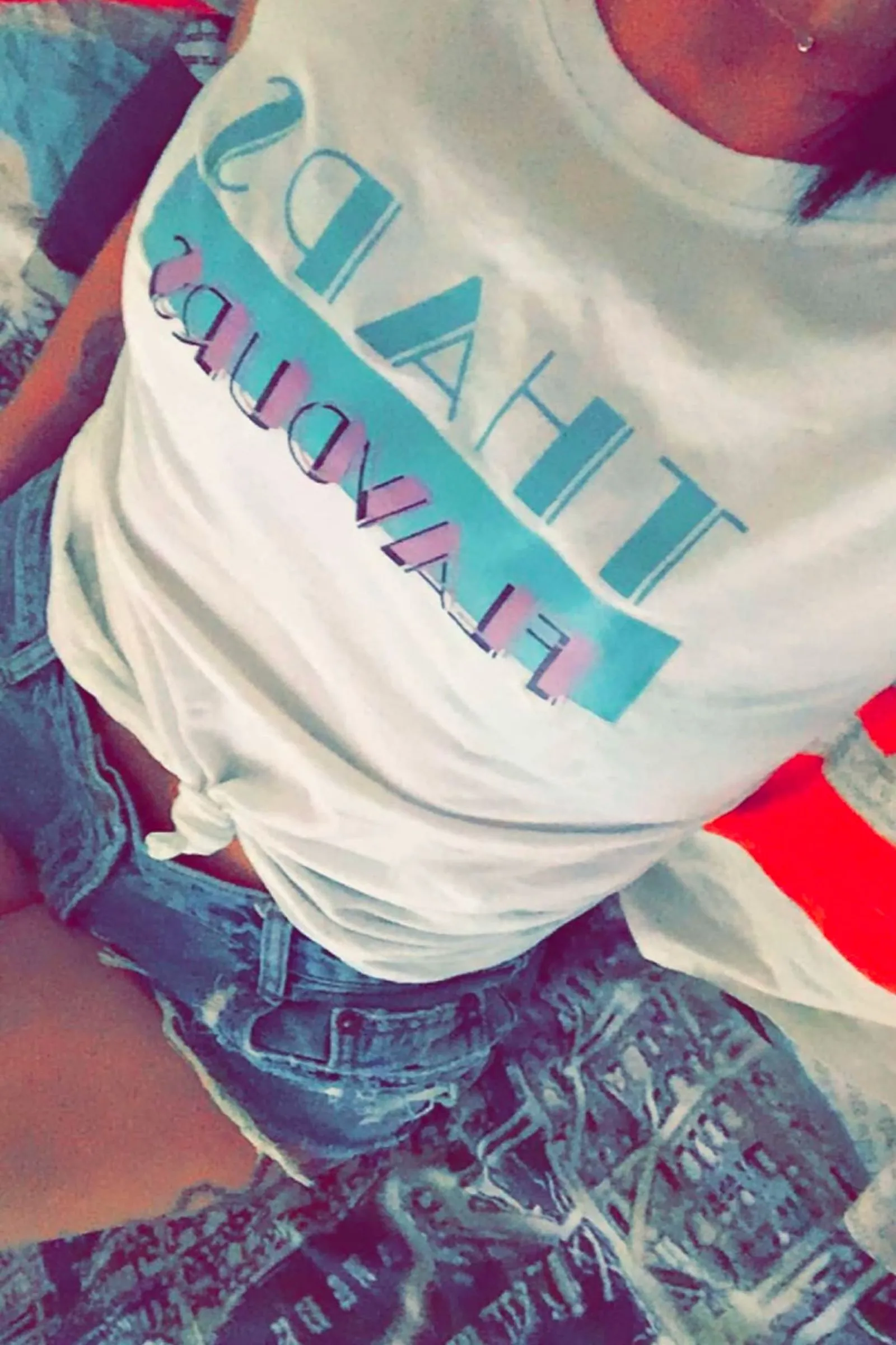 Person_wearing_a_printed_shirt