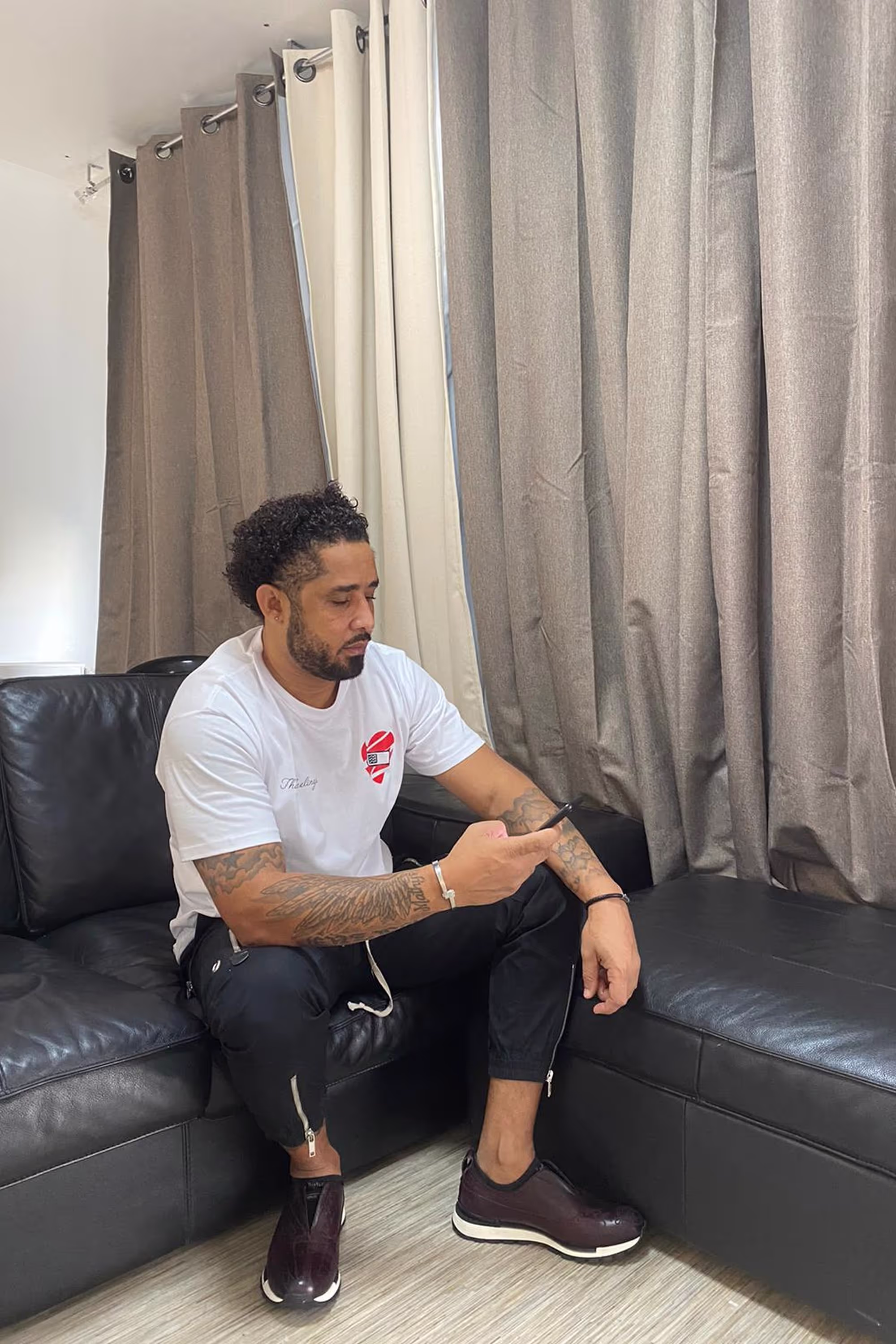 Man_sitting_on_a_couch