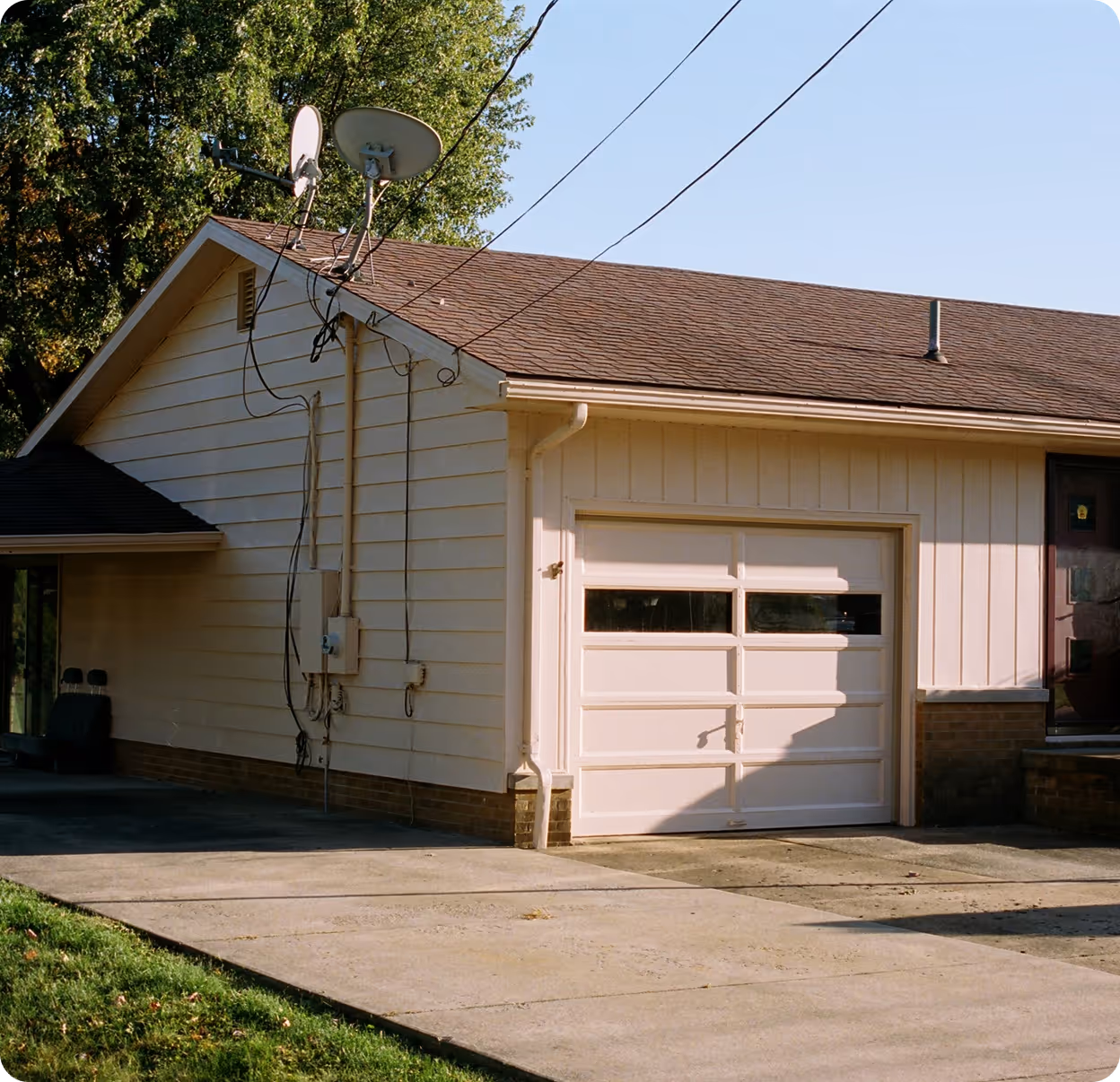 Image with a house and garage