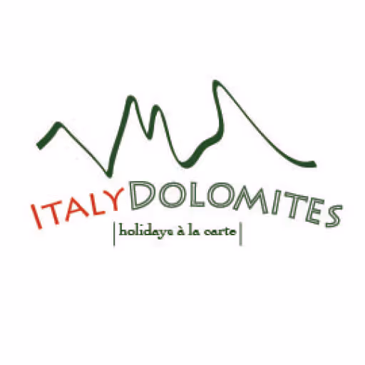 Logo with an abstract green mountain outline and the text 'ITALY DOLOMITES holidays à la carte'.