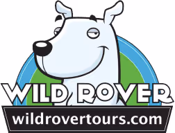 Smiling white cartoon dog head above the text Wild Rover and website wildrovertours.com.