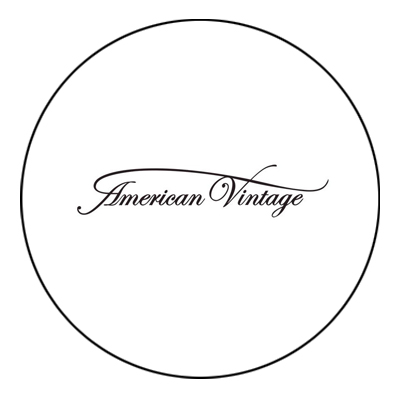 Circular logo with the text 'American Vintage' in elegant cursive font.