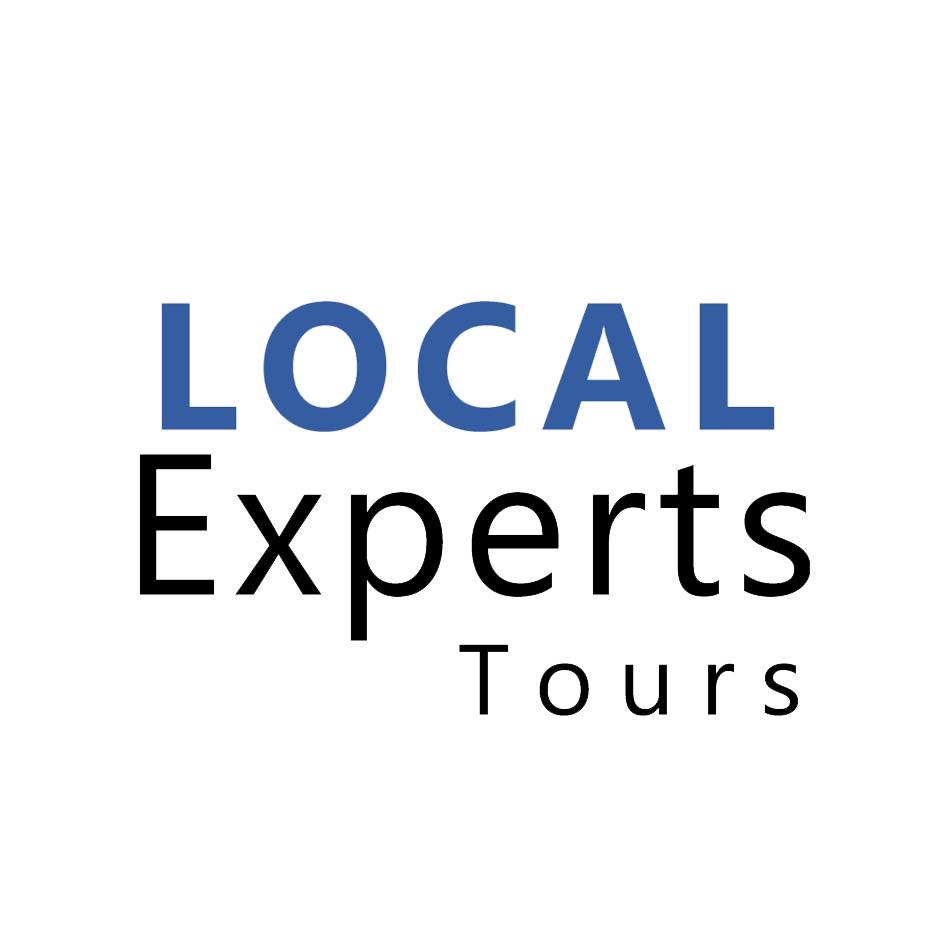 Logo of Local Experts Tours with the word LOCAL in blue and Experts Tours in black text on white background.