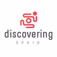 Discovering Spain logo with red abstract design and text below.