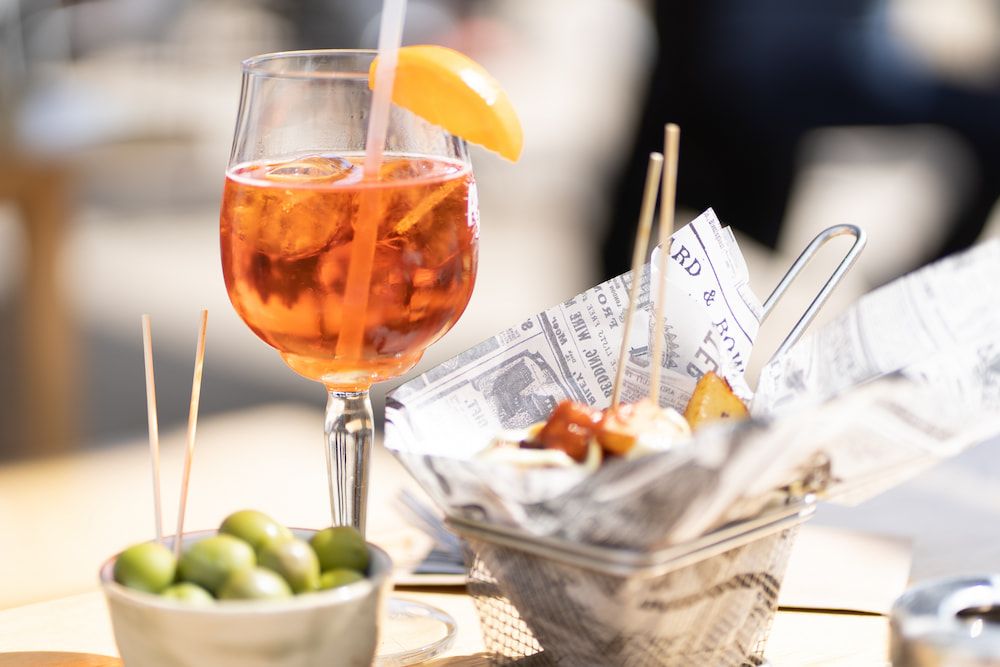 tapas with aperol spritz