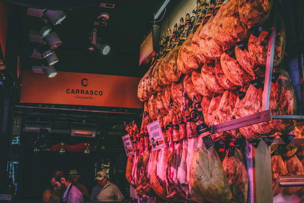 market with jamon hanging