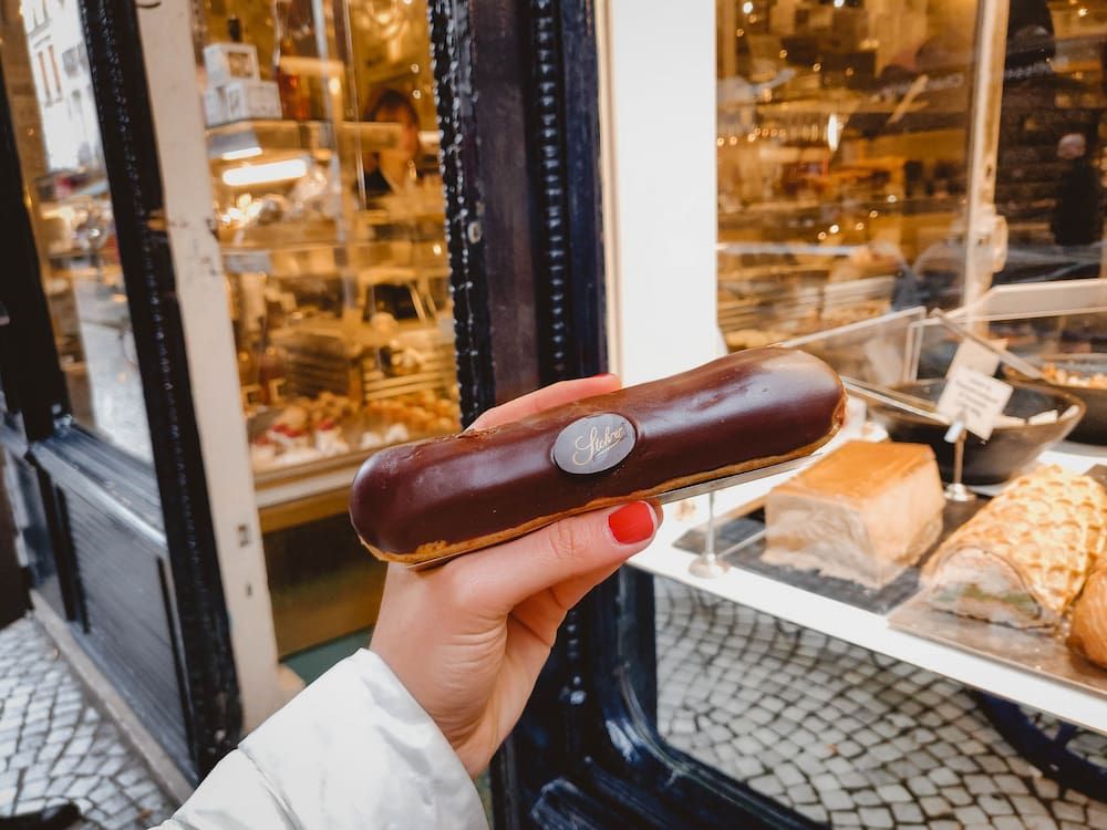 Someone holding a French pastry